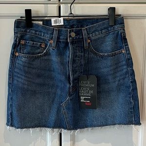 Levi’s Premium deconstructed denim skirt w button fly. Brand new w tags. Size 27